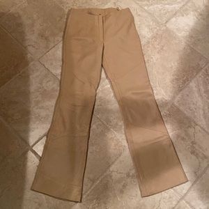Vintage WILSONS LEATHER camel tan colored boot cut pants. Size 2